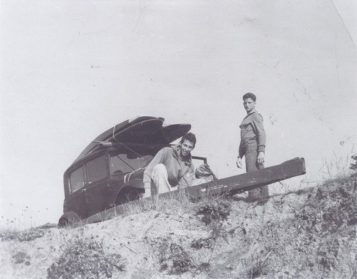 Dick Anderson, Bill Lidderdale with Bob's Model A on cliff at Pleasure Point