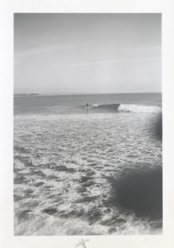 Unidentified surfers at the river point