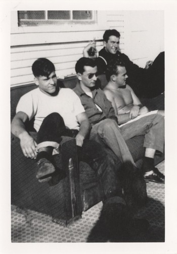 Terrence Hickey, unidentified, James Henninger, and Harry Mayo at the clubhouse