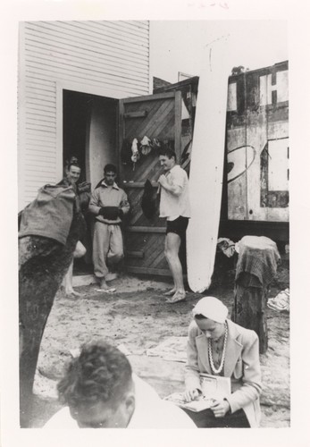 Kerwins from Hermosa Beach, John Booth, Jim, Patterson, and Aneeta. Tommy Roussel in the foreground at Cowell Beach Board House