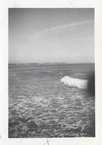 Unidentified surfers at the river point