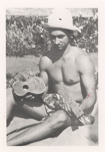 E. J. Oshier with broken ukulele at Cowell Beach