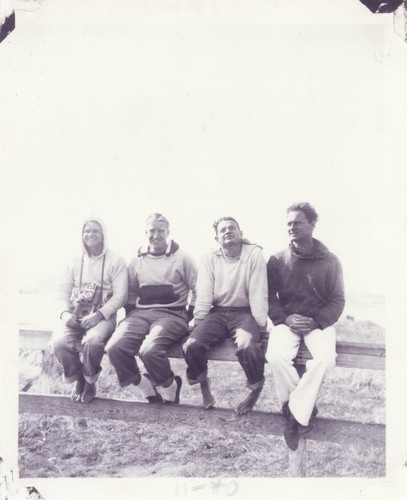 Charley Frans, Fred Hunt, P. B. "Smitty" Smith, E. J. Oshier on fence at the river point