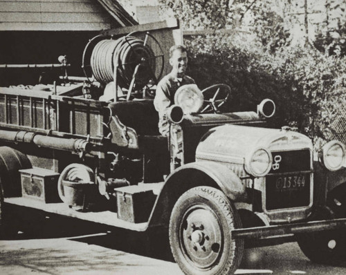 Ed Aikens on Fire Truck, Lancaster, California, circa 1935