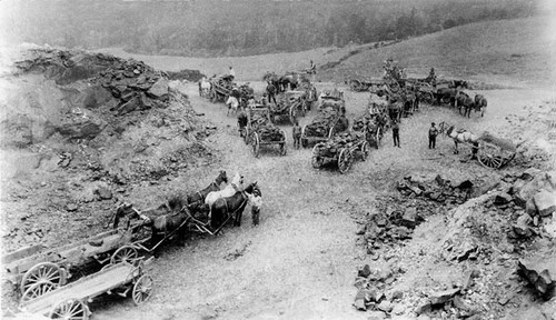 Wagons being loaded with bituminous rock on the Cowell Ranch