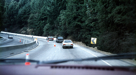 Cars in the one open lane of Highway 17 after the 1989 earthquake