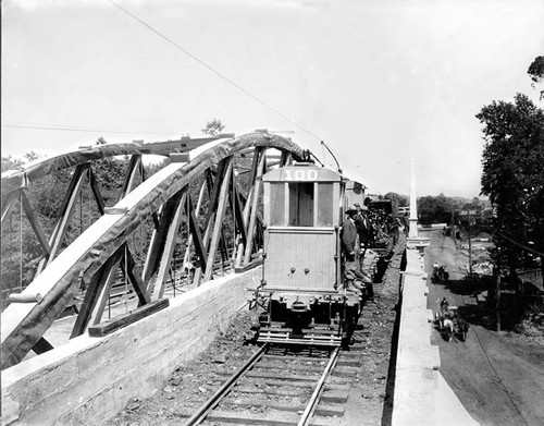 Work motor No. 100 crossing the Water Street Bridge