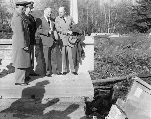 Officials visiting the flood-damaged Soquel Bridge