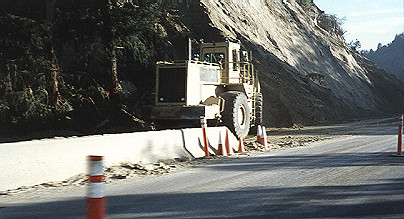 Bulldozer clearing damage on Highway 17