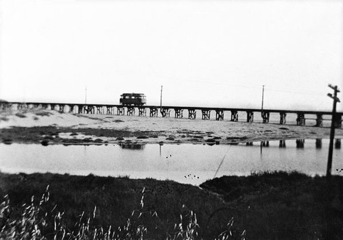 Along the Capitola line, a Santa Cruz bound Union Traction streetcar heads westward