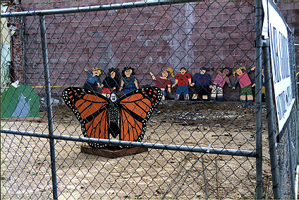 Butterfly/man public art in a demolition site