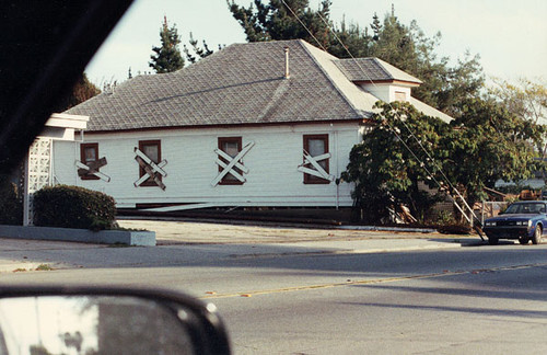 Boarded-up windows after the earthquake