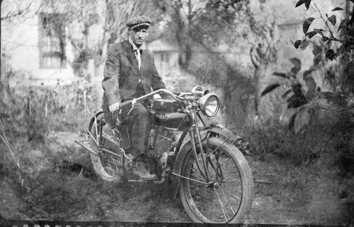 George H. Wilson on His Indian Motorcycle