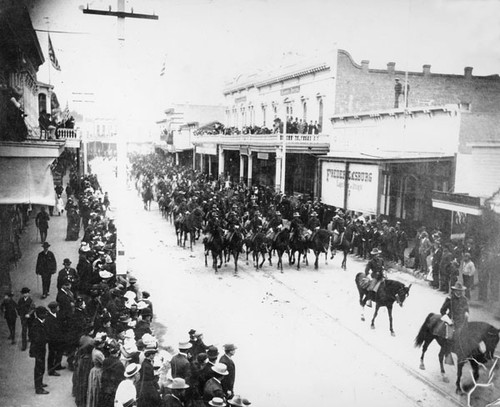 Cavalry riding through downtown Santa Cruz