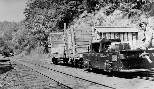 The Loma Prieta Lumber Company's motorcar #3 pushing a flatcar