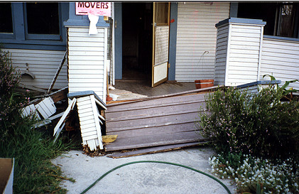 House with a damaged porch and steps