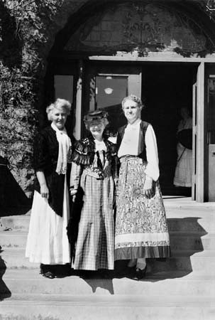 Library staff in period costumes