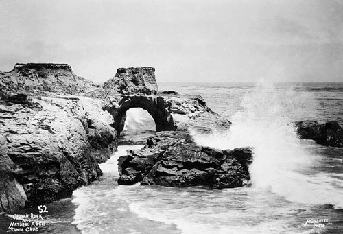 Ocean cliffs showing "Crown Rock" and a natural arch