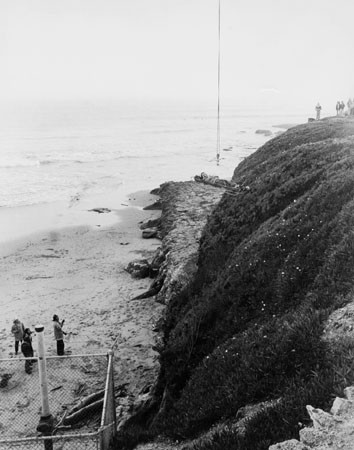 Santa Cruz City fire fighters performing a cliff rescue