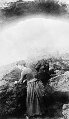 Laura Hecox, lightkeeper, among the rocks