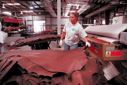 Salz Tannery employee working with hides