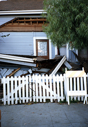 House in Santa Cruz with roof, porch, and siding damage