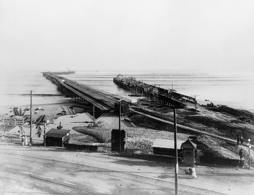 Santa Cruz City Municipal Wharf is to the left with the older railroad wharf to the right