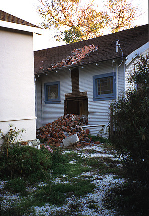 One of many houses that lost their brick chimneys