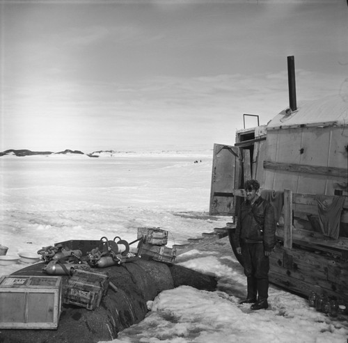 Mikhail V. Propp near the movable diving shelter on the sledge (balok)