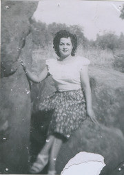 Francis Luna sitting on a boulder, Los Angeles County (Calif.)lifornia