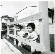 Martinez brothers at the wooden fence, East Los Angeles, California