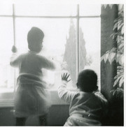 Martinez brothers at the window, East Los Angeles, California