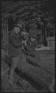 Tom Garvey and Moore with a goat