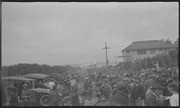 Crowd and cars at girl's race