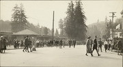 Crowd outside of the Mill Valley railway depot and people walking across Miller Avenue