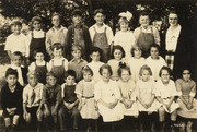 Group portrait of Miss Johnson and her class, Homestead School