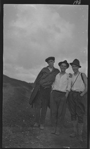 Three men standing at Willow Camp