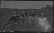 Four men sitting on the Dipsea Trail