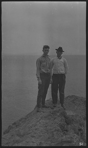Two men standing on rocks at Big Lagoon