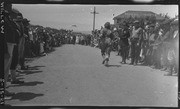 Finish of girl's race with runner