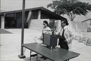 Two Speakers At Podium