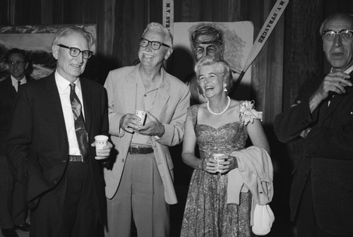 At the Roger Revelle farewell party at Scripps Institution of Oceanography, left to right; Martin Wiggo Johnson, Marston Cleaves Sargent, Ellen Virginia (Clark) Revelle (spouse of Roger Revelle), and Carl Henry Eckart. September 26, 1964