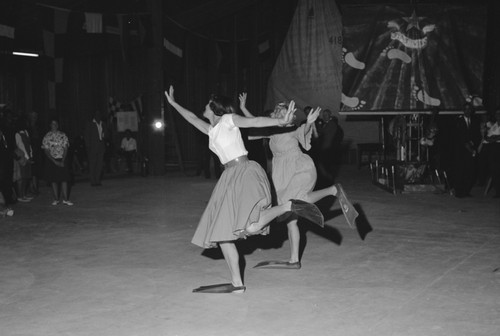 Farewell to Revelle Party, Nan Limbaugh and Thea Schultze performing the flip flop dance