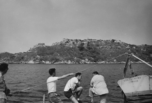 [Transpac Expedition Chief Scientist Robert L. Fisher, center, on Spencer F. Baird]