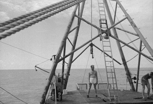 [Robert Lester Wisner standing under A-frame, R/V HORIZON]