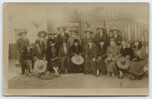 Tourists in Mexican costume near U.S.-Mexico border station