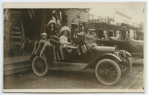 Automobile passengers with Tijuana, Mex. pennant