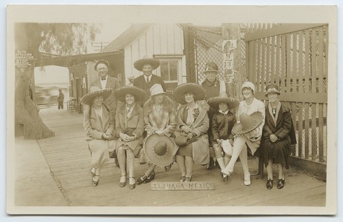 Tourists in sombreros near U.S.-Mexico border station