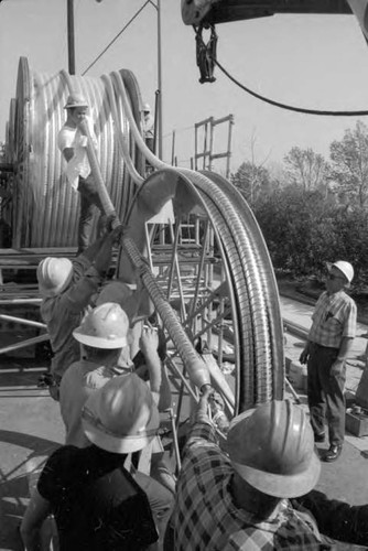 Laying high voltage aluminum underground cable at Oxnard Blvd. and Fulton Ave