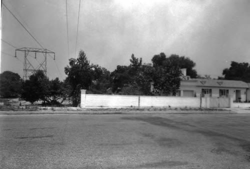 Power lines in built-up residential area